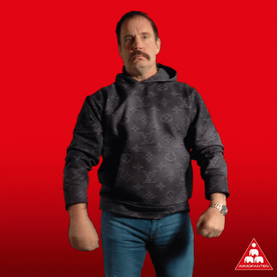A Man In A Black Louis Vuitton Hoodie Is Dancing GIF
