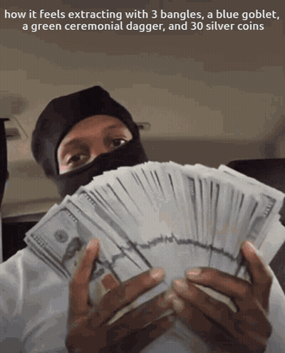 A Man In A Black Mask Is Holding A Stack Of Money And A Green Ceremonial Dagger GIF