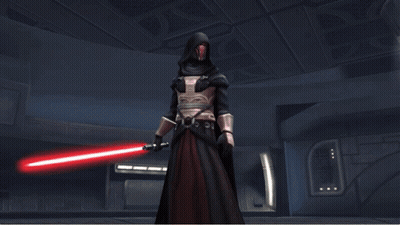 A Man In A Black Robe Holding A Red Light Saber GIF