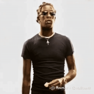 A Man In A Black Shirt And Sunglasses Is Holding A Piece Of Paper . GIF