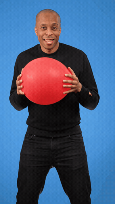 A Man In A Black Shirt Holds A Red Balloon In His Hands GIF