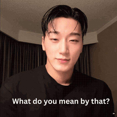 A Man In A Black Shirt Is Being Asked What Do You Mean By That GIF
