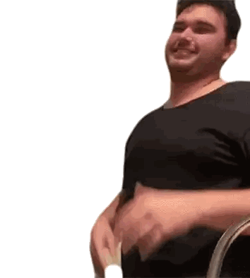 A Man In A Black Shirt Is Holding A Piece Of Paper In His Hand And Smiling . Sticker