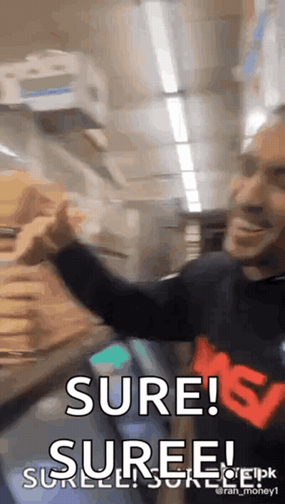 A Man In A Black Shirt Is Holding A Stack Of Money And Says Sure ! Suree ! GIF