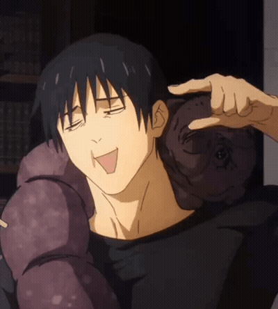 A Man In A Black Shirt Is Holding A Stuffed Animal On His Shoulders . GIF
