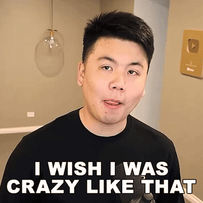 A Man In A Black Shirt Is Making A Funny Face And Says I Wish I Was Crazy Like That GIF