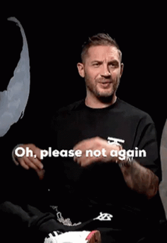 A Man In A Black Shirt Is Making A Funny Face And Says Oh Please Not Again GIF