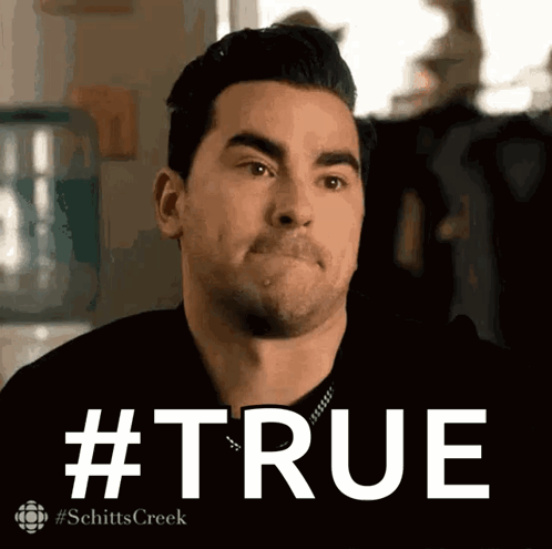 A Man In A Black Shirt Is Making A Funny Face And The Words #True Are Behind Him GIF