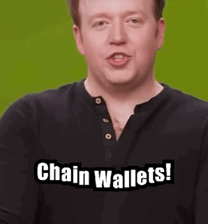 A Man In A Black Shirt Is Saying Chain Wallets ! GIF