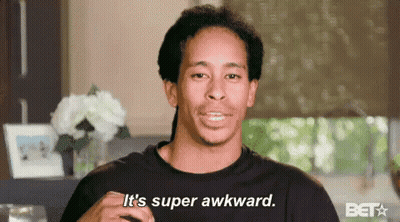 A Man In A Black Shirt Is Saying `` It 'S Super Awkward . '' GIF