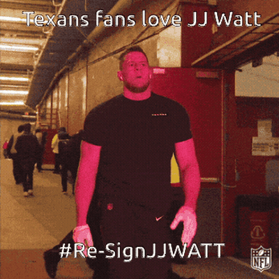 A Man In A Black Shirt Is Standing In A Hallway With The Words " Texans Fans Love Jj Watt " On The Bottom GIF