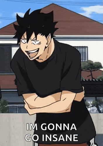 A Man In A Black Shirt Is Standing In Front Of A House With His Arms Crossed . GIF