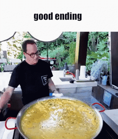 A Man In A Black Shirt Is Standing In Front Of A Large Pan Of Soup With The Words Good Ending Written Above Him GIF
