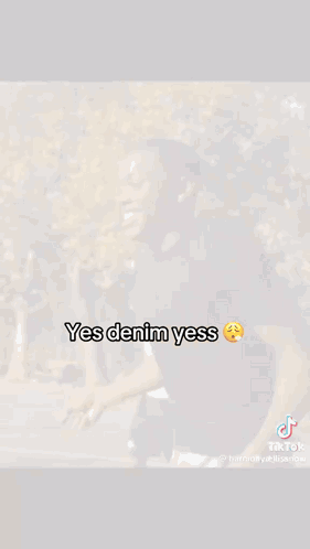 A Man In A Black Shirt Is Standing On A Basketball Court With His Arms Outstretched . GIF