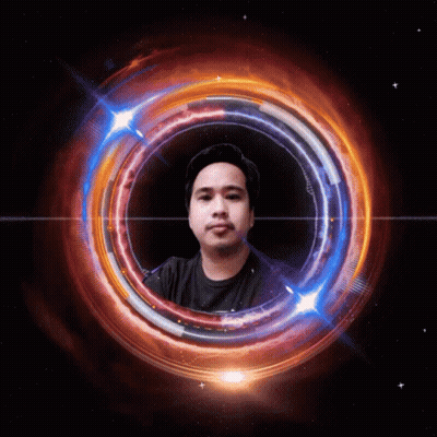 A Man In A Black Shirt Is Surrounded By A Glowing Circle GIF