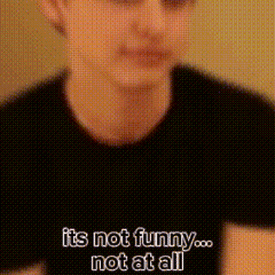 A Man In A Black Shirt Is Talking About Being Funny . GIF