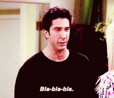 A Man In A Black Shirt Is Talking To A Woman And Says Bla-Bla-Bla GIF