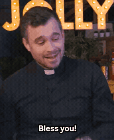A Man In A Black Shirt Says Bless You GIF