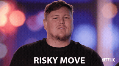 A Man In A Black Shirt Says Risky Move In White Letters GIF