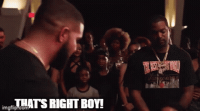 A Man In A Black Shirt Says That 'S Right Boy In Front Of A Crowd Of People GIF
