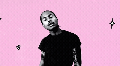 A Man In A Black Shirt Stands In Front Of A Pink Background That Says Some Times I Love You Too GIF