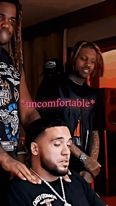 A Man In A Black Shirt With The Word Uncomfortable On The Bottom Right GIF