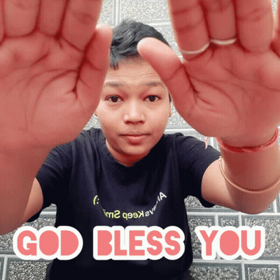 A Man In A Black Shirt With The Words God Bless You Written On It GIF