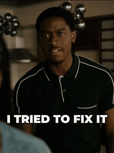 A Man In A Black Shirt With The Words I Tried To Fix It Above Him GIF