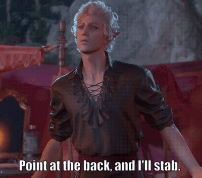 A Man In A Black Shirt With The Words Point At The Back And I 'Ll Stab Above Him GIF