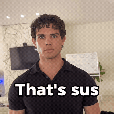 A Man In A Black Shirt With The Words That 'S Sus On The Bottom GIF