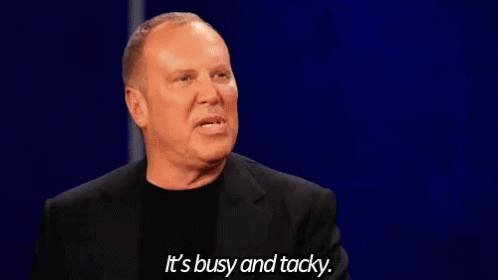 A Man In A Black Suit And Black Shirt Is Talking About Being Busy And Tacky . GIF