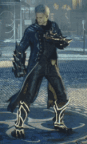 A Man In A Black Suit And Boots Is Dancing GIF