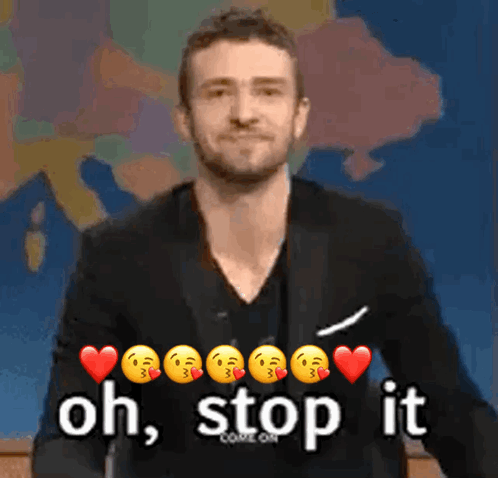 A Man In A Black Suit Is Giving A Thumbs Up With The Words Oh Stop It GIF