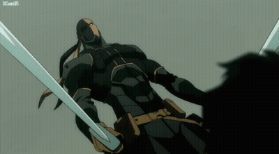 a man in a black suit is holding two swords and a xcomgif is below him