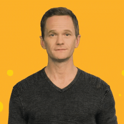 A Man In A Black Sweater Making A Funny Face GIF
