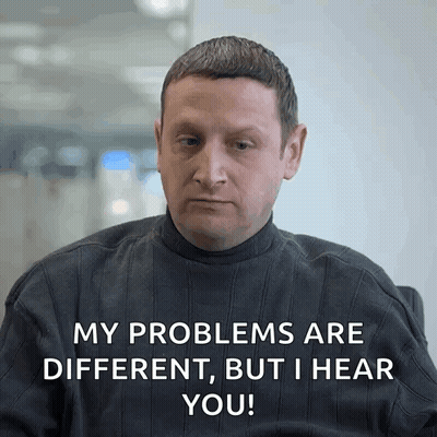 A Man In A Black Sweater Says " My Problems Are Different But I Hear You " GIF