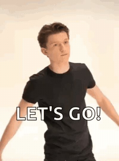 A Man In A Black T-Shirt Is Dancing And Saying `` Let 'S Go ! '' GIF