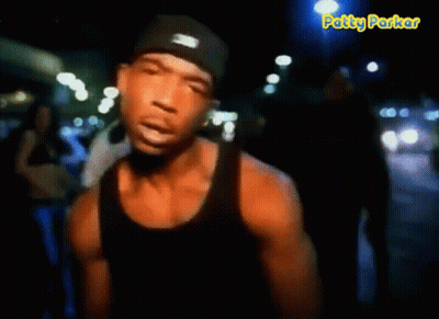 A Man In A Black Tank Top Says It 'S Murdaa GIF