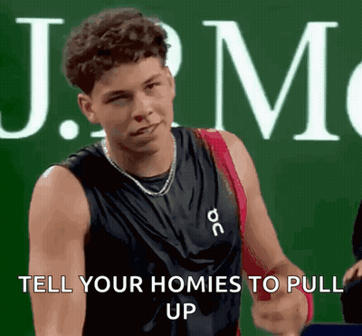 A Man In A Black Tank Top Says Tell Your Homies To Pull Up .. GIF