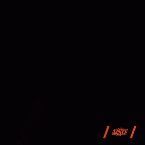 A Man In A Black Tank Top With The Letters Osu On The Bottom Right GIF