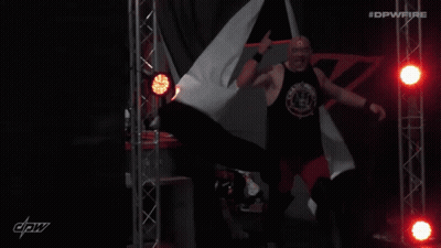A Man In A Black Tank Top With The Name Luther Written On It GIF