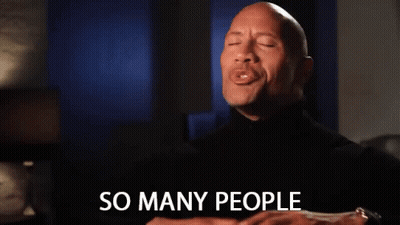 A Man In A Black Turtleneck Is Smiling And Says So Many People GIF