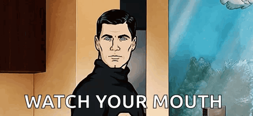 A Man In A Black Turtleneck Is Standing In Front Of A Door And Says Watch Your Mouth . GIF