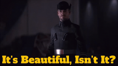 A Man In A Black Uniform With The Words It 'S Beautiful Isn 'T It On The Bottom GIF