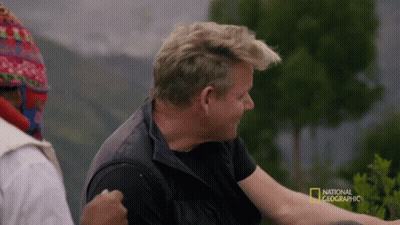 A Man In A Black Vest Is Being Interviewed By National Geographic GIF