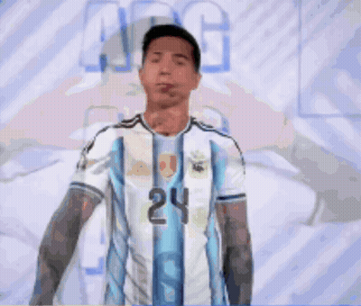 A Man In A Blue And White Jersey With The Number 24 Pointing At The Camera GIF