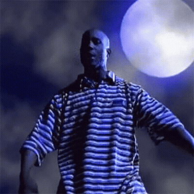 A Man In A Blue And White Striped Shirt Is Dancing In Front Of A Blue Moon . GIF