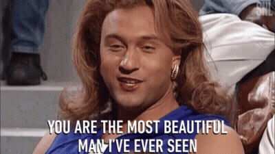 A Man In A Blue Dress With The Words You Are The Most Beautiful Man I 'Ve Ever Seen GIF