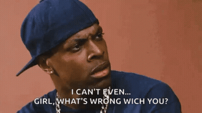 A Man In A Blue Hat Is Covering His Face With His Hand While Talking To A Girl . GIF