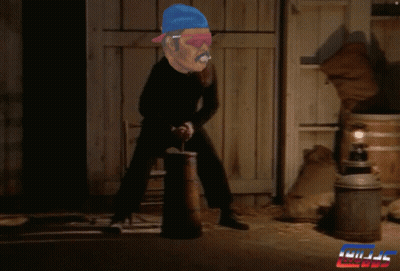 A Man In A Blue Hat Is Holding A Barrel In Front Of A Sign That Says ' Kill ' GIF